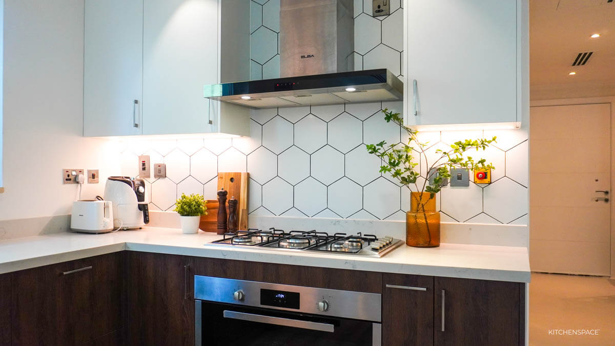 Walnut Kitchen with Geometric Backsplash